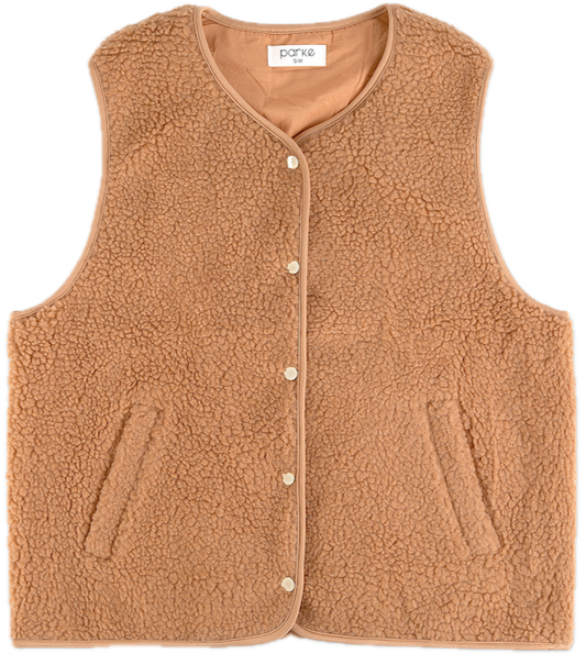 sherpa vest flat lay - caramel