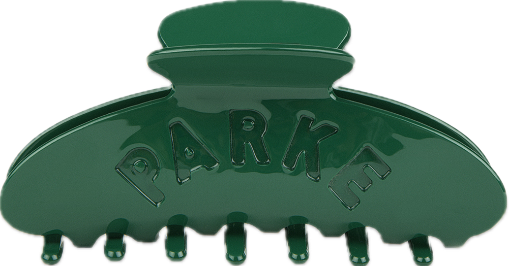 green claw clip flat lay -green